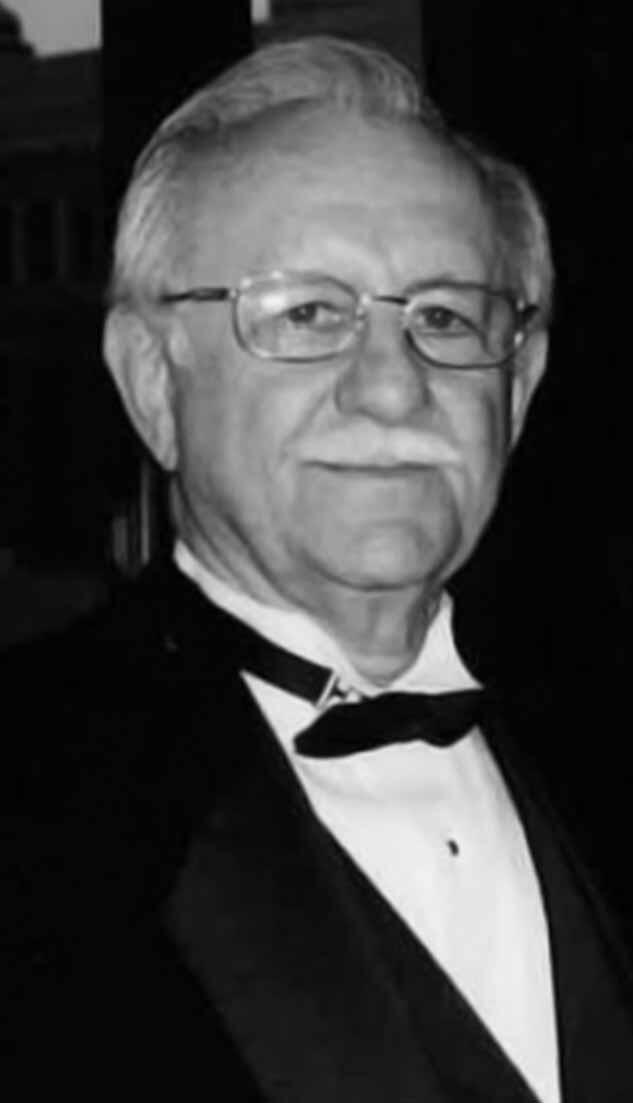 Recent photo of founder W. W. Kelly Jr. wearing tuxedo
